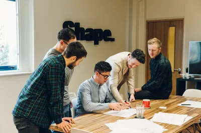 The team go through a project with Mike