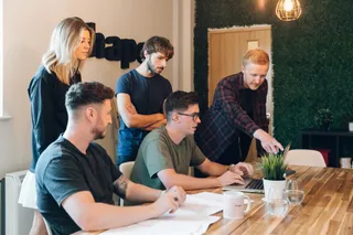 MadeByShape share a morning meeting to go through the days tasks